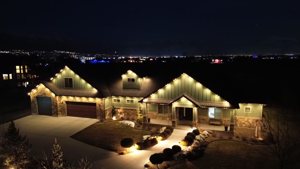 Drone shot of permanent LED lighting on home roofline